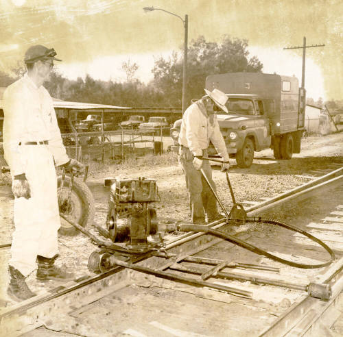 Two Men Working on the Railroad