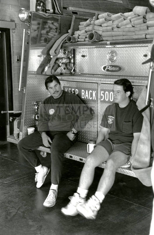 Tempe Fire Department Firemen sitting on Back of Fire Truck
