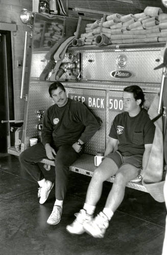 Tempe Fire Department Firemen sitting on Back of Fire Truck