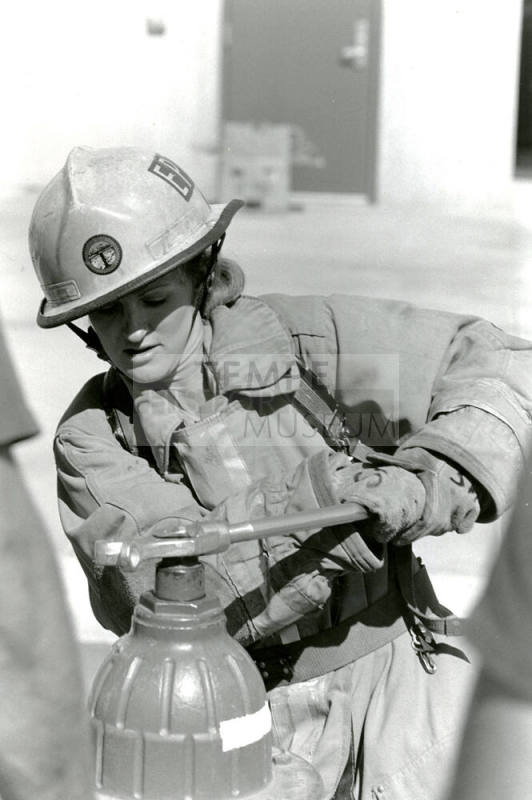 Tempe Fire Department Firewoman using Hydrant Wrench