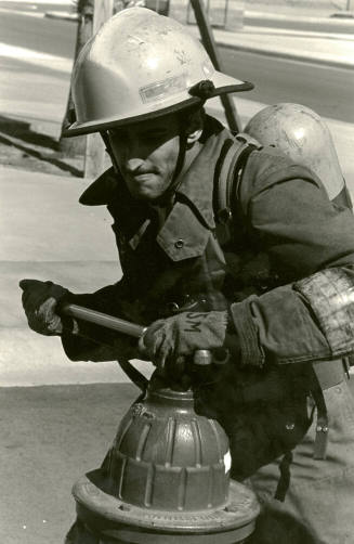 Tempe Fire Department Fireman using Hydrant Wrench