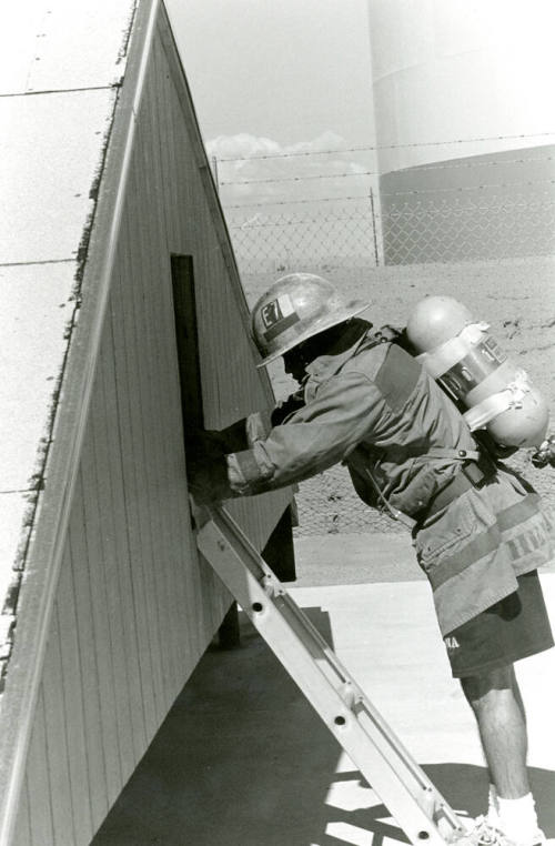 Tempe Fire Department Fireman using Ladder