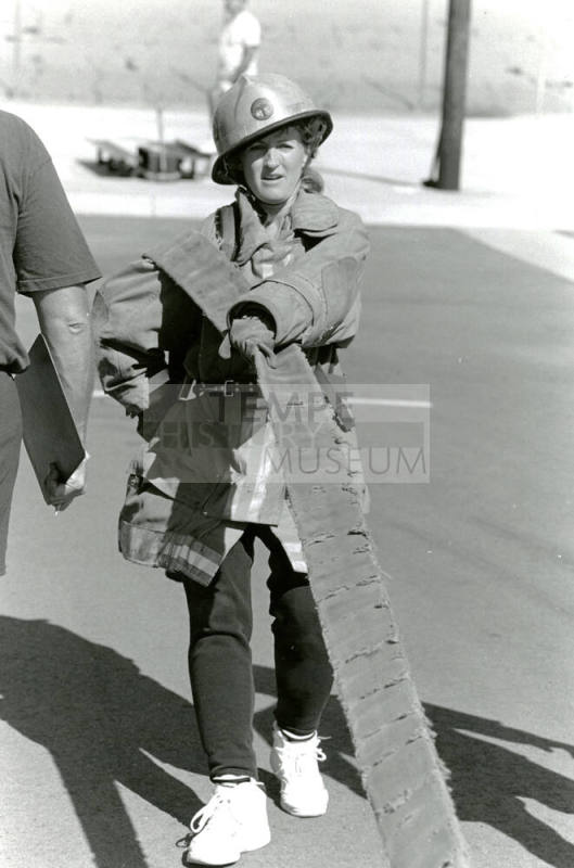 Tempe Fire Department Firewoman Pulling Hose