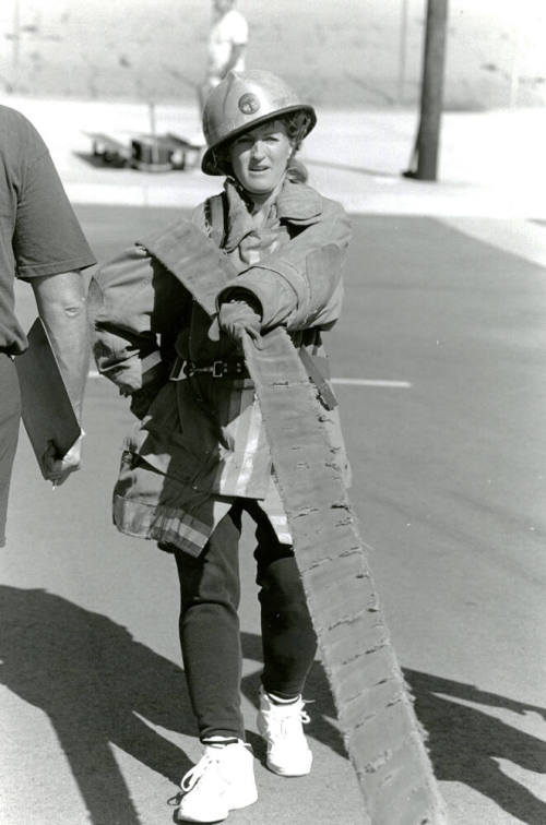 Tempe Fire Department Firewoman Pulling Hose