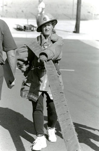 Tempe Fire Department Firewoman Pulling Hose