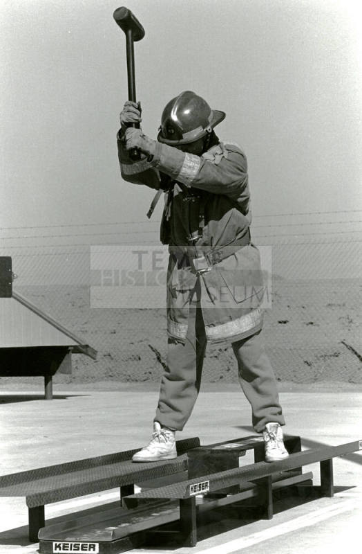Tempe Fire Department Fireman Swinging Sledge Hammer