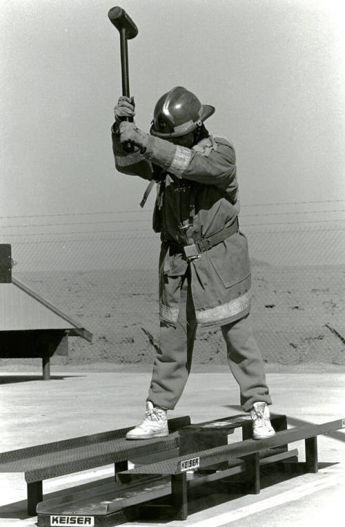 Tempe Fire Department Fireman Swinging Sledge Hammer