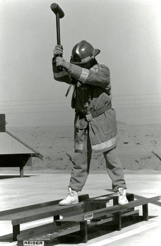 Tempe Fire Department Fireman Swinging Sledge Hammer