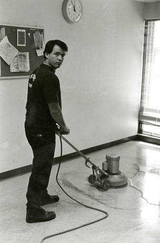 Tempe Fire Department Fireman Scrubbing Floor