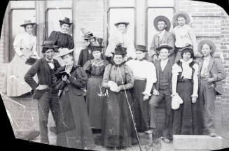 Group photo of 14 people standing