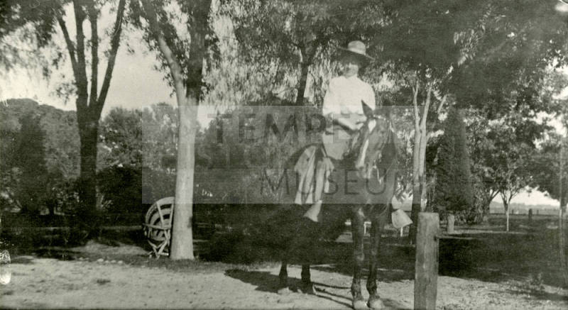 Woman riding horse on Peteresen property