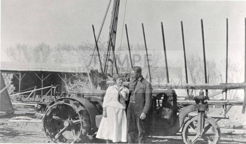Man and woman standing on Petersen property