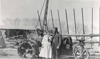Man and woman standing on Petersen property