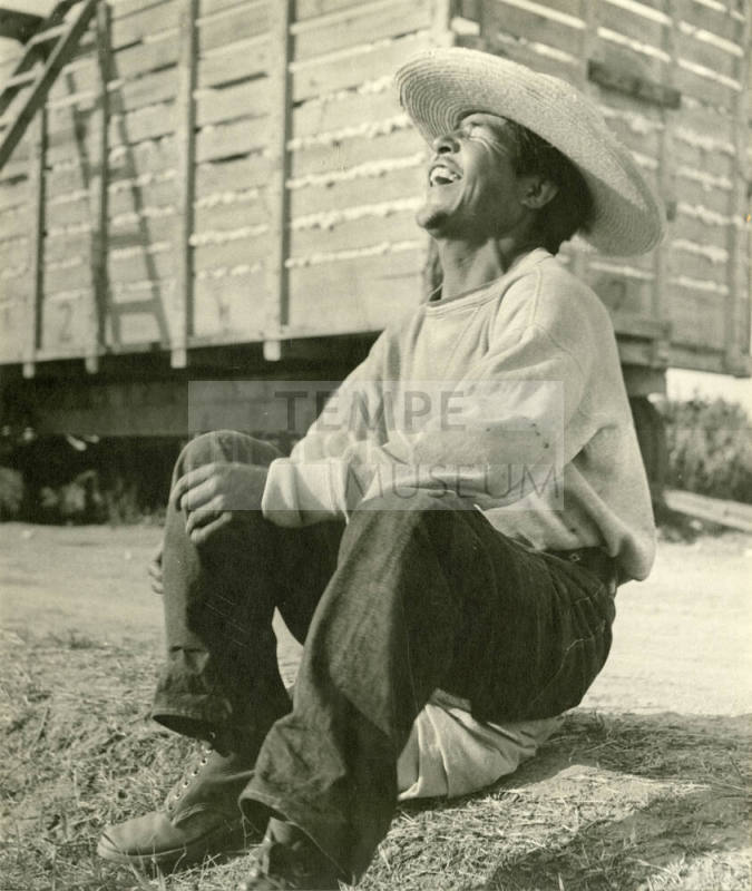 Laughing cotton farmer