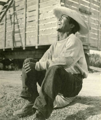 Laughing cotton farmer