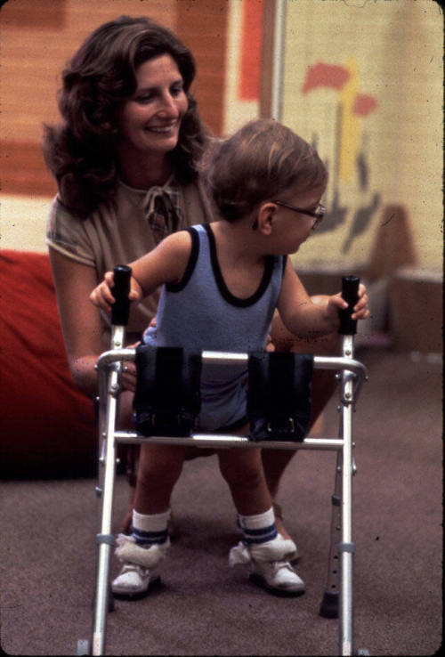 Dr. Roberts with Handicapped Child