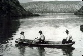 Men in Canoe in Roosevelt Lake, Arizona