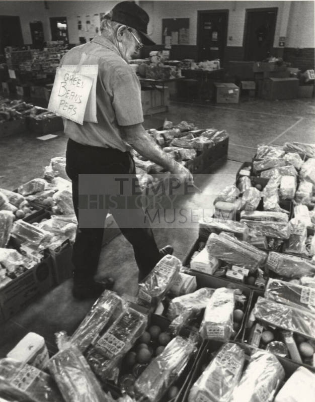 Bob Smith Checks Salvation Army Food Box