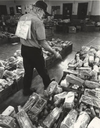 Bob Smith Checks Salvation Army Food Box