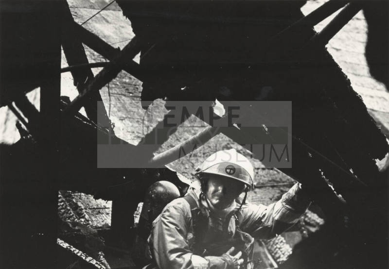 Tempe Fireman Surveys Legend City Damage