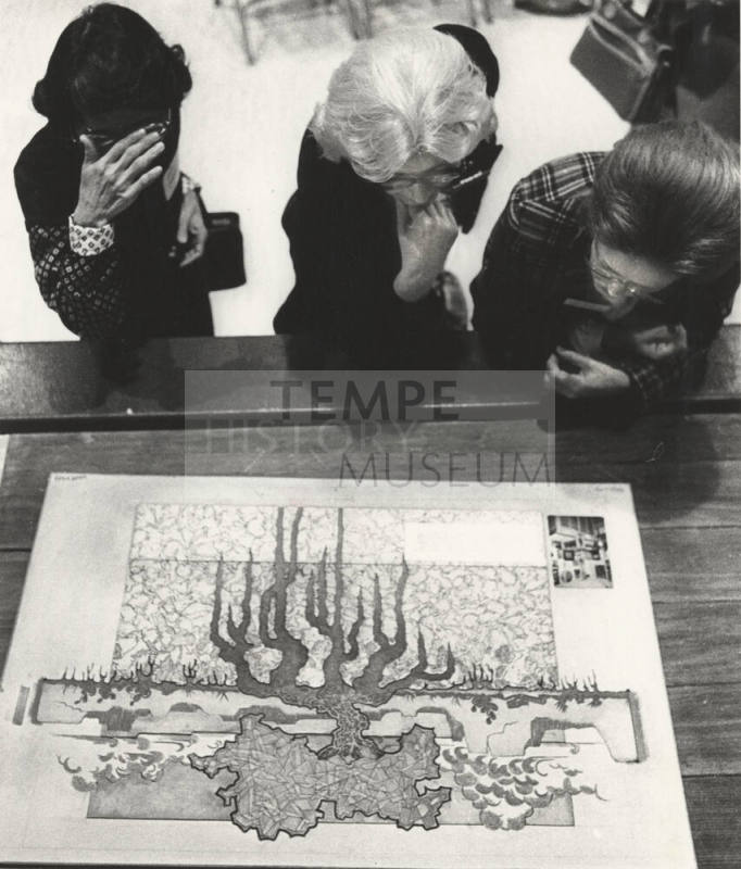 Tempe Art League Members Inspect Woodcut