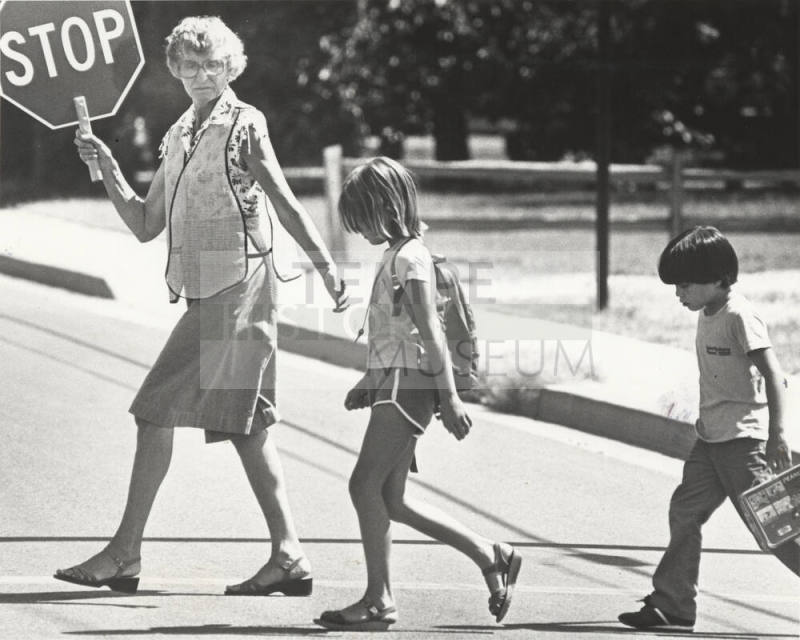 School Crossing Guard Helping Children