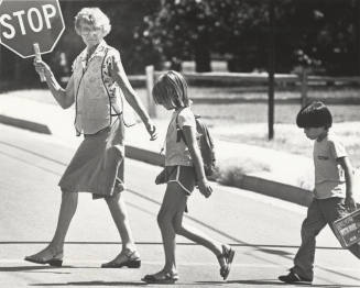 School Crossing Guard Helping Children