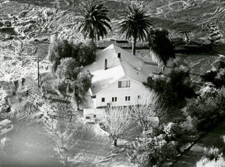 Floodwaters Surround Unidentified House