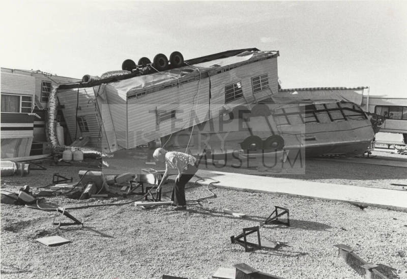 Mary Lou Knoll Surveys Trailer Damage