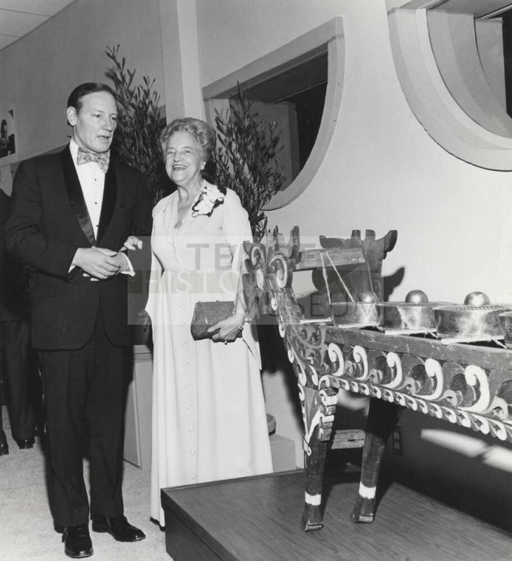 Couple Admire Bolton Collection of Music