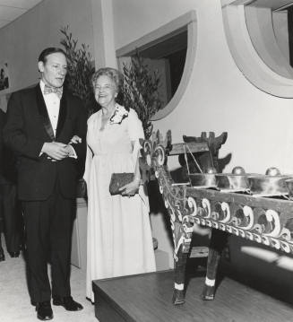 Couple Admire Bolton Collection of Music