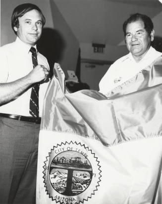 Anthony Gives Mayor Mitchell City Flag