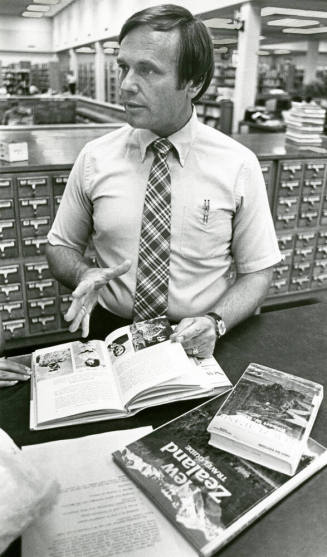 Mayor Mitchell Checks Out Library Books