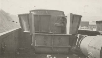 Photo- Number 7 turbine from Roosevelt Dam on train car at Miami, Arizona