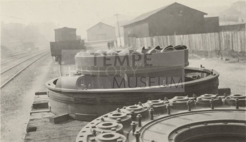 Photo- Number 7 turbine from Roosevelt Dam on train car at Miami, Arizona