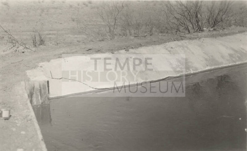 Photo- Power Canal, cement lining at 13 mile flume, cracked on river side