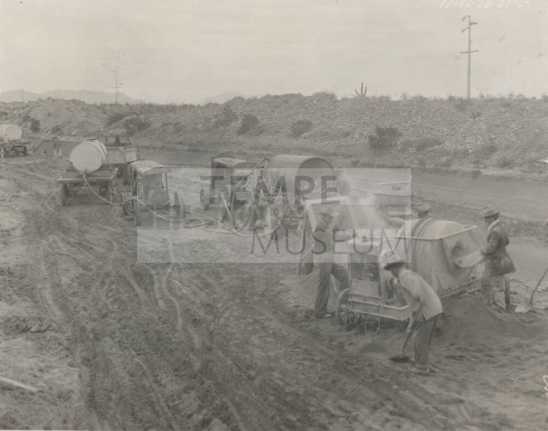 Photo-workers using portable Guniting plant to repair Great Eastern Canal lining