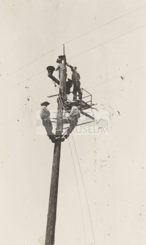 Photo- hot line work on 44 KV power lines