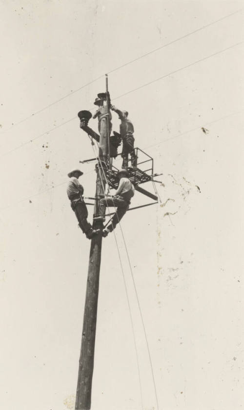 Photo- hot line work on 44 KV power lines