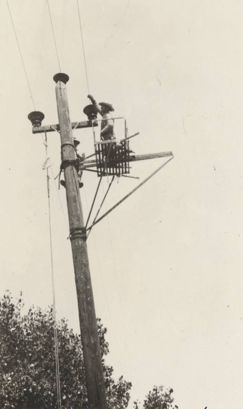 Photo- hot line work on 44 KV power lines
