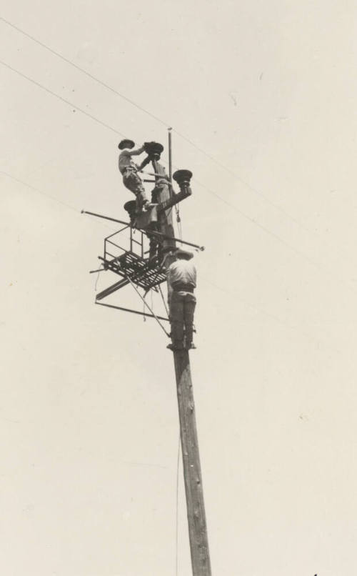 Photo- hot line work on 44 KV power lines