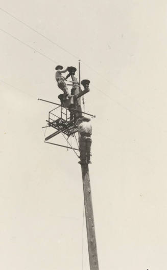 Photo- hot line work on 44 KV power lines