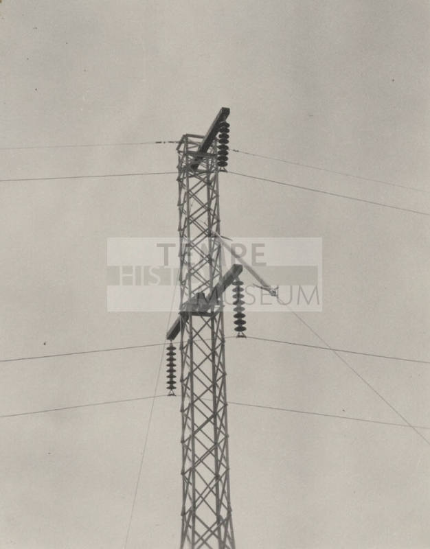 Photo- 110 KV line tower with wood cross arms