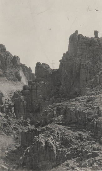 Miami, Superior line tower over rugged mountain terrain