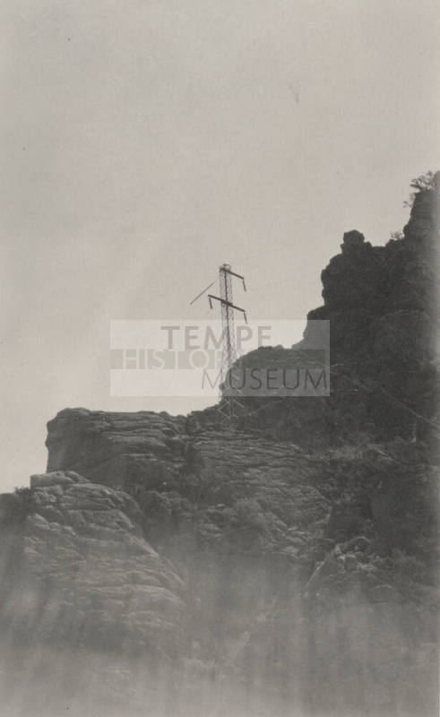 Miami-Superior line tower over Rugged Mountain terrain