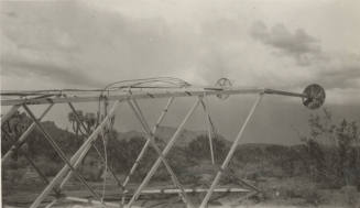 Line Tower lying on its side on desert floor