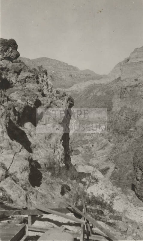 Shows tower footing for a Horse-Mesa Line Tower in Rugged Mountain Area