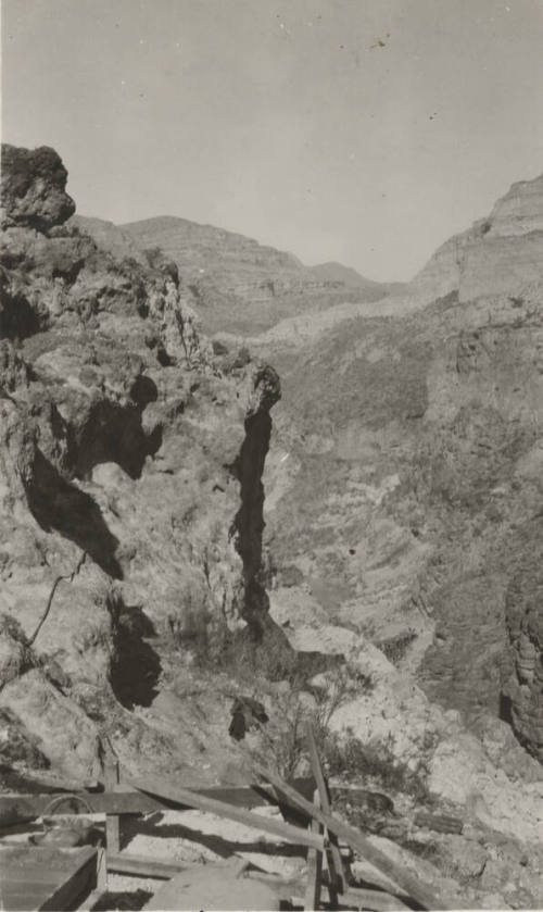 Shows tower footing for a Horse-Mesa Line Tower in Rugged Mountain Area