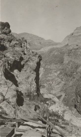 Shows tower footing for a Horse-Mesa Line Tower in Rugged Mountain Area