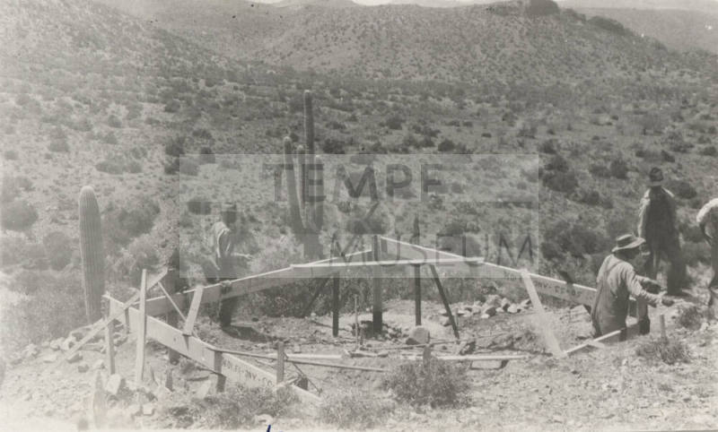 Workers constructing wood forms for Line Tower footing